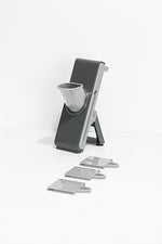 Multi-purpose mandoline with pusher